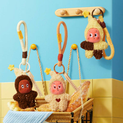 Three Twinkle Twinkle Savor the Moment pendants hanging from wall hooks over a basket of bread
