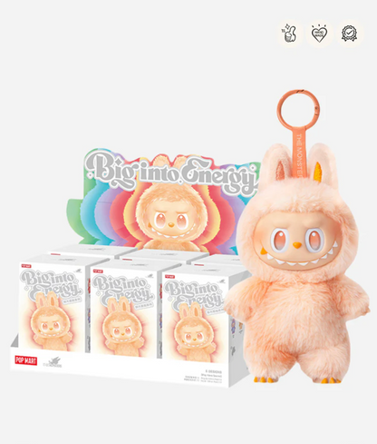 Labubu Big into Energy display case of sealed boxes next to the peach Happiness pendant; badge icons top right