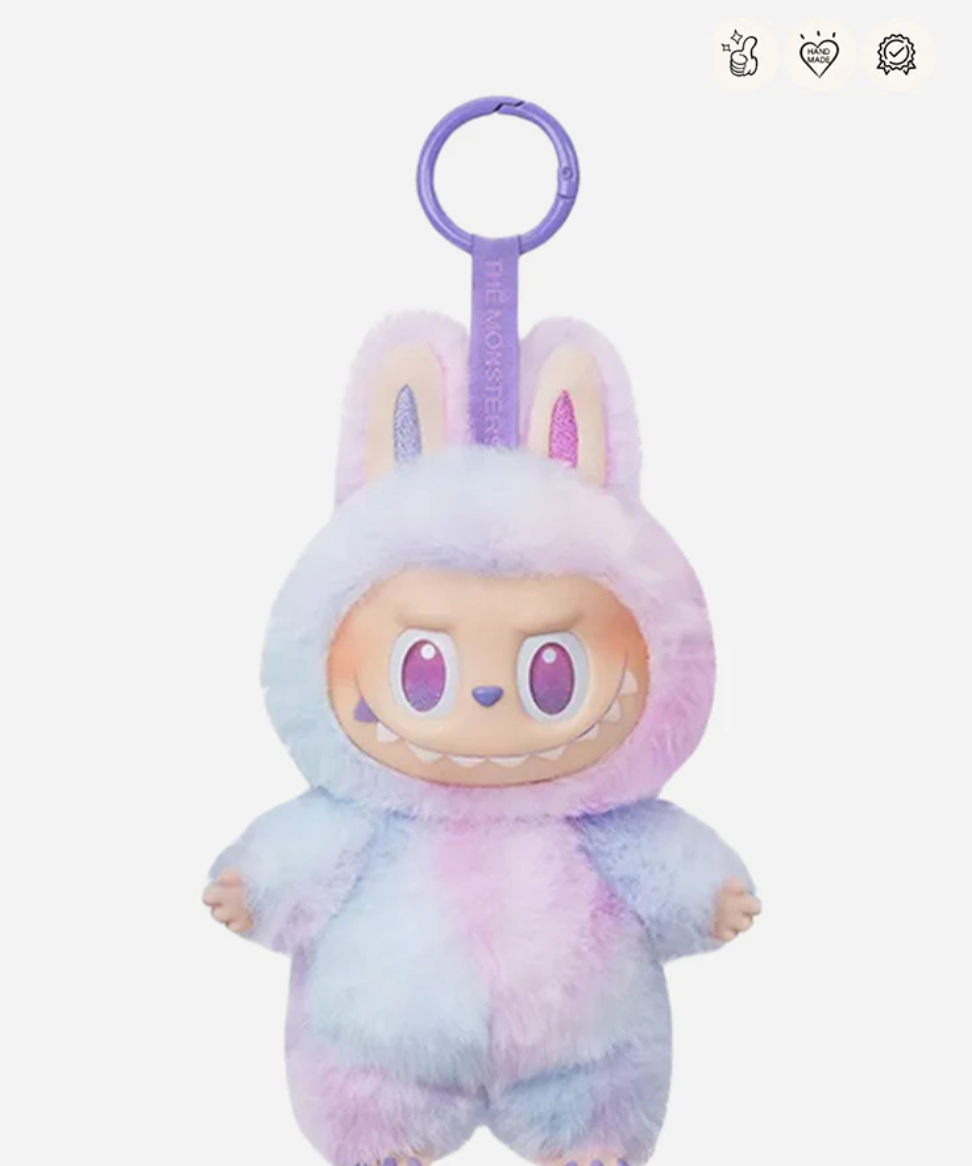 Luck, the lilac and blue Labubu Big into Energy pendant with a purple keyring; small badge icons top right