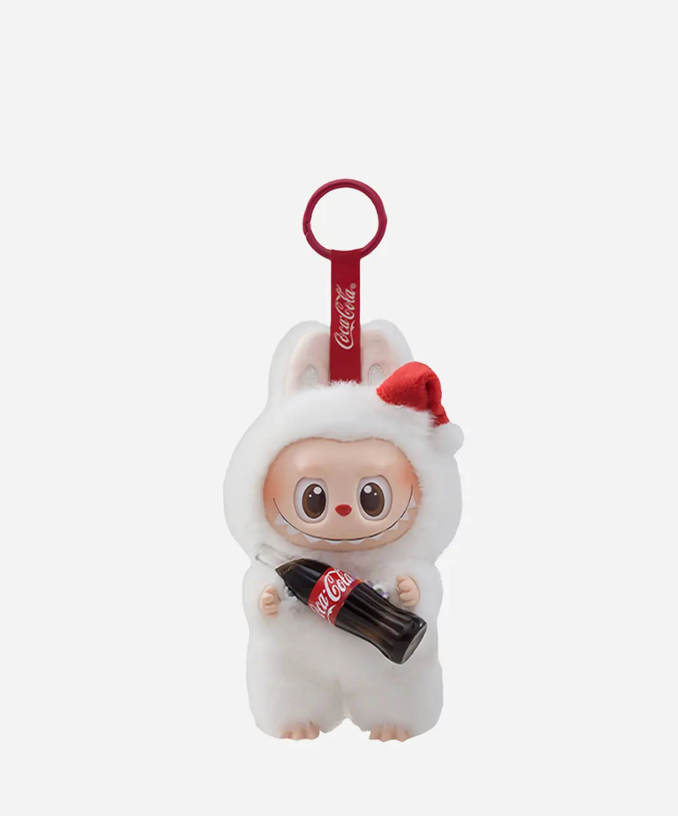 White Labubu Coca-Cola pendant in a red Santa hat holding a Coke bottle, on a red Coca-Cola keyring