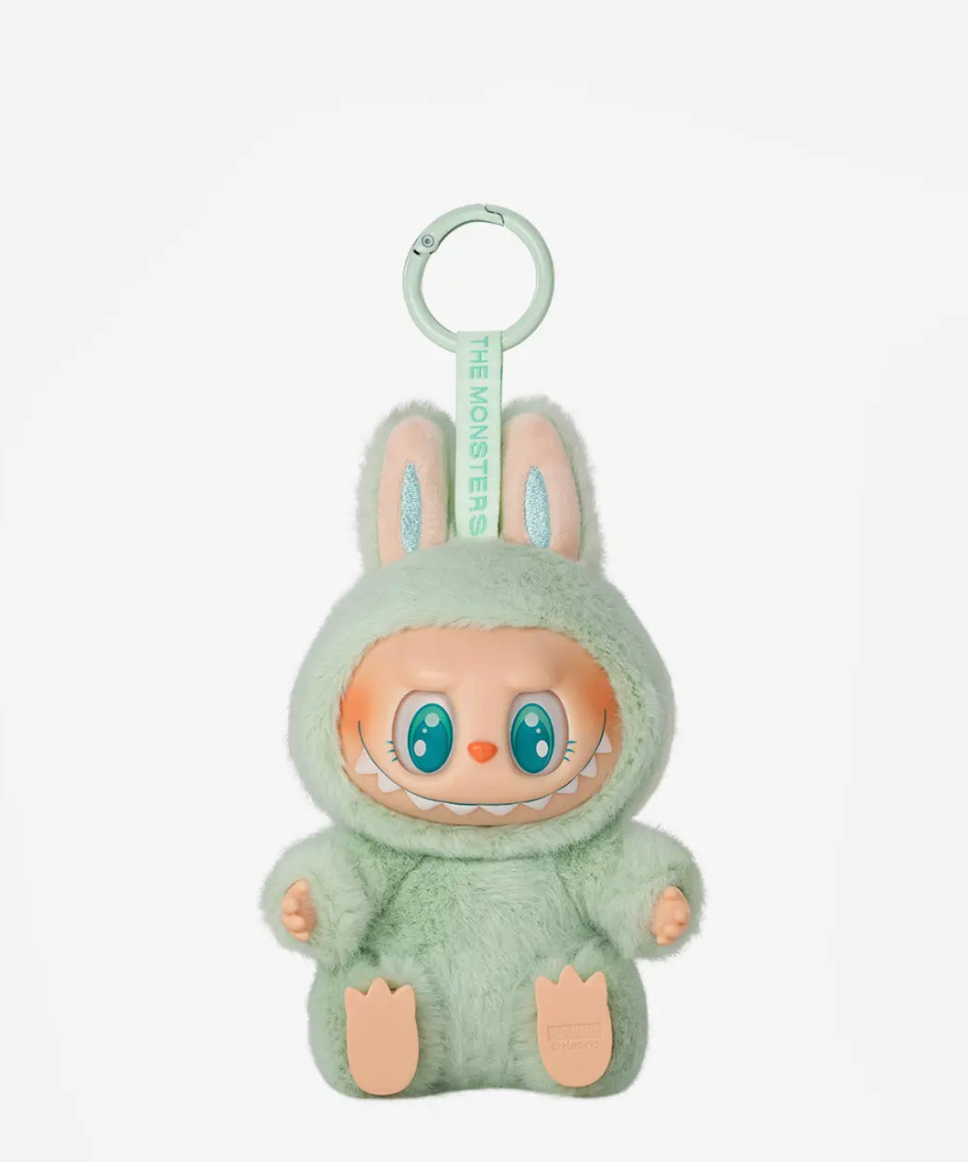 Ququ, the mint green Labubu Have a Seat figure with teal eyes, on a mint keyring