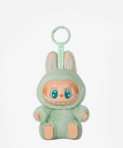 Ququ, the mint green Labubu Have a Seat figure with teal eyes, on a mint keyring