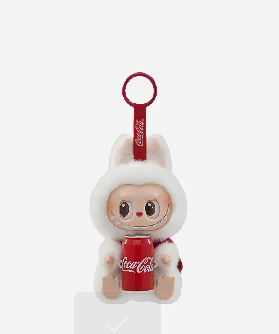 White Labubu Coca-Cola pendant with a red scarf holding a Coke can; a faint grey checkmark box overlaps the bottom