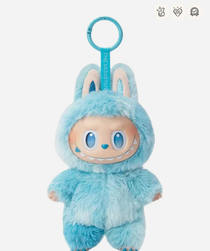 Hope, the blue Labubu Big into Energy pendant with a blue keyring; small badge icons top right