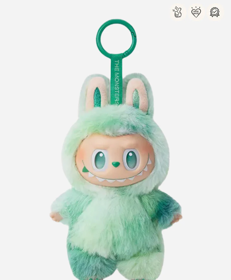 Serenity, the green Labubu Big into Energy pendant with a green keyring; small badge icons top right