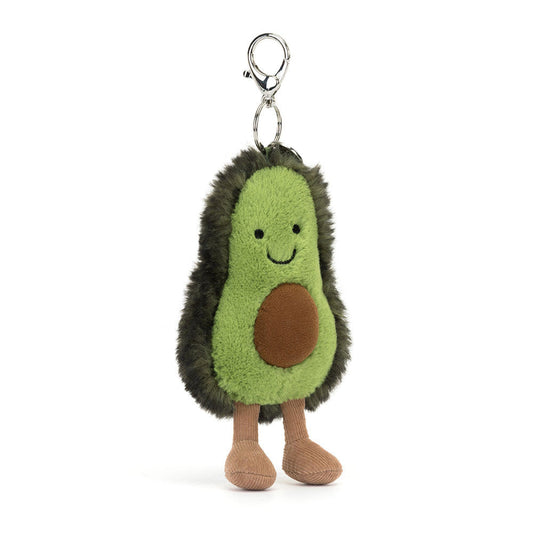 Jellycat Amuseables Avocado plush bag charm, front: smiling green avocado half with a brown pit, cord legs and a metal clip