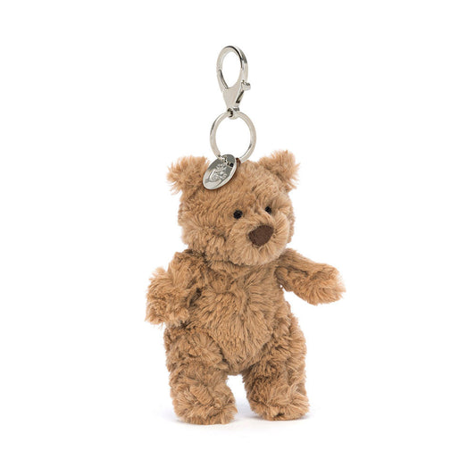 Jellycat Bartholomew Bear plush bag charm, front: fluffy brown bear with a metal clip and round tag