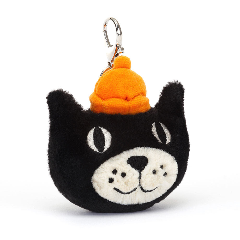 Jellycat Jack Cat 25th Anniversary bag charm: black cat face with a cream muzzle, an orange bobble hat and a metal clip