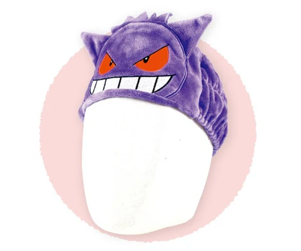 Gengar Pokemon Hair Band worn on a white mannequin head, against a pink circle