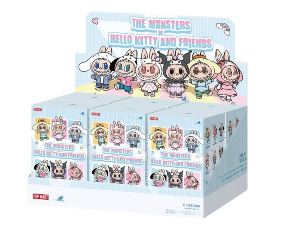Labubu x Hello Kitty and Friends display case of sealed boxes; label reads 6 designs, may have secret