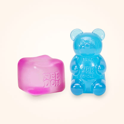 Squishy Gift Box Duo: a pink NeeDoh Nice Cube next to a blue NeeDoh Gummy Bear, shown to scale on a cream background