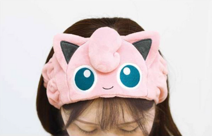 Jigglypuff Pokemon Hair Band worn by a model with brown hair, holding hair back off the forehead