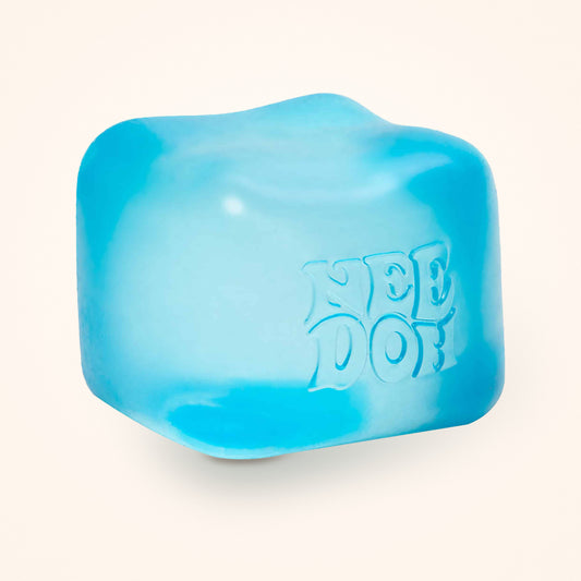 Blue NeeDoh Nice Cube squishy on a cream background