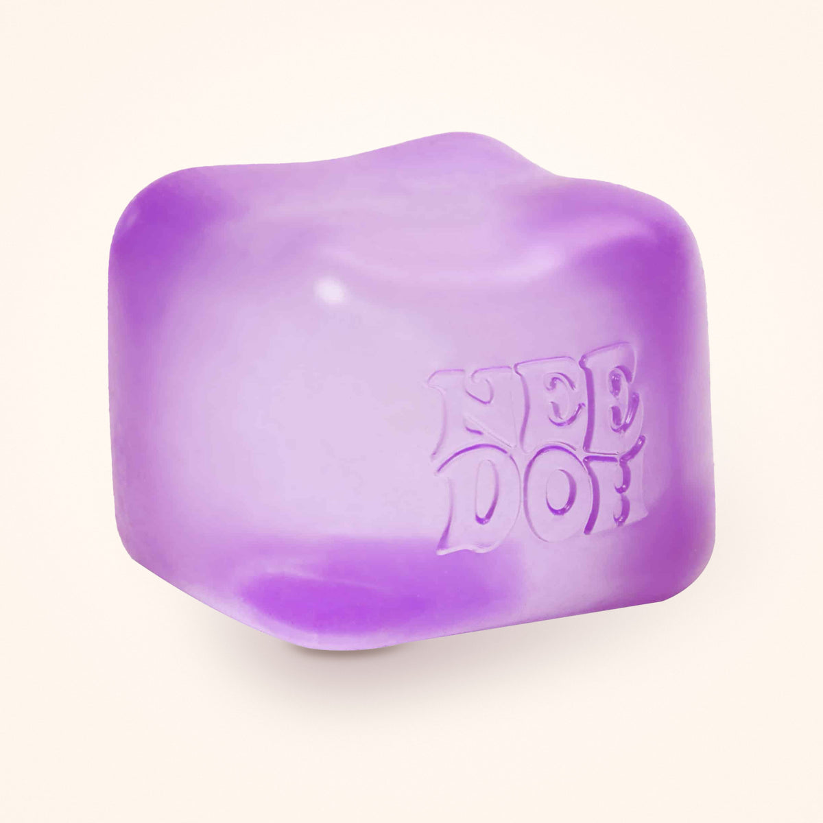 Purple NeeDoh Nice Cube squishy on a cream background