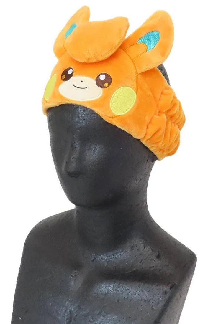 Pawmi Pokemon Hair Band worn on a black mannequin head, seen at an angle